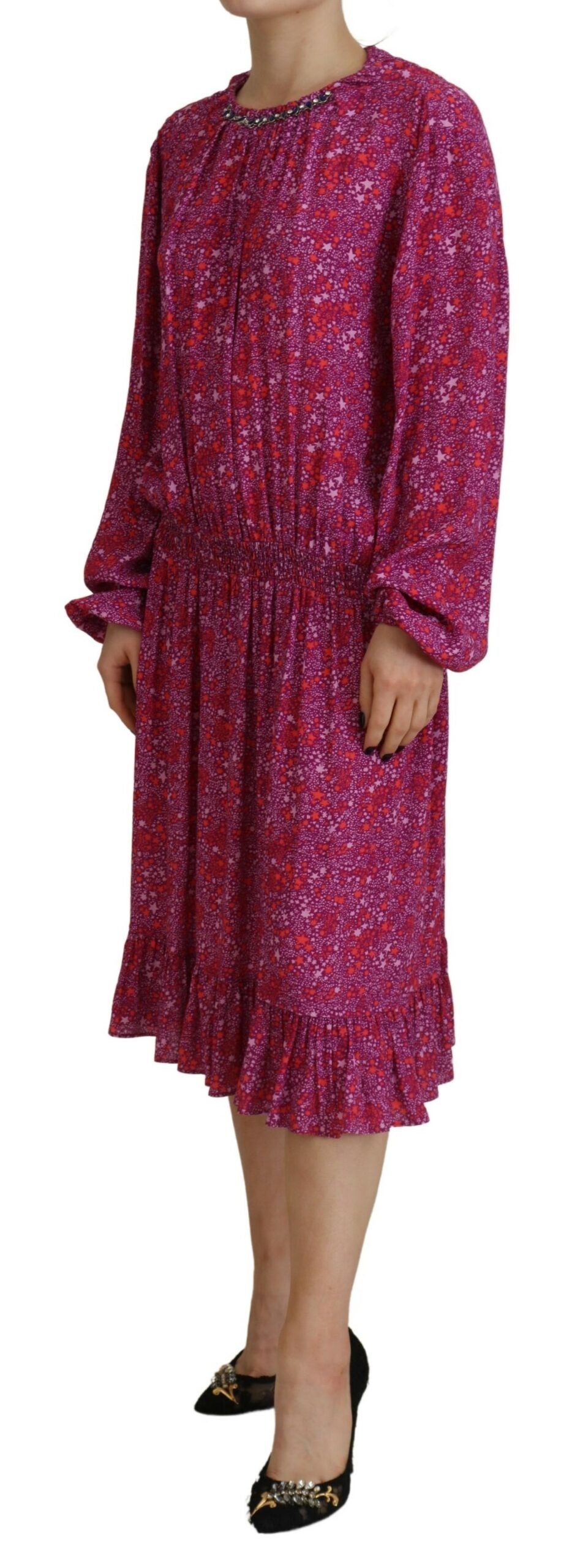 Robe longue Fuchsia à étoiles ornées de Dsquared², manches longues et détails brillants, design élégant et tendance.