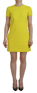 Robe courte jaune en nylon à manches courtes et col rond de Dsquared², vue de face, style moderne et décontracté.