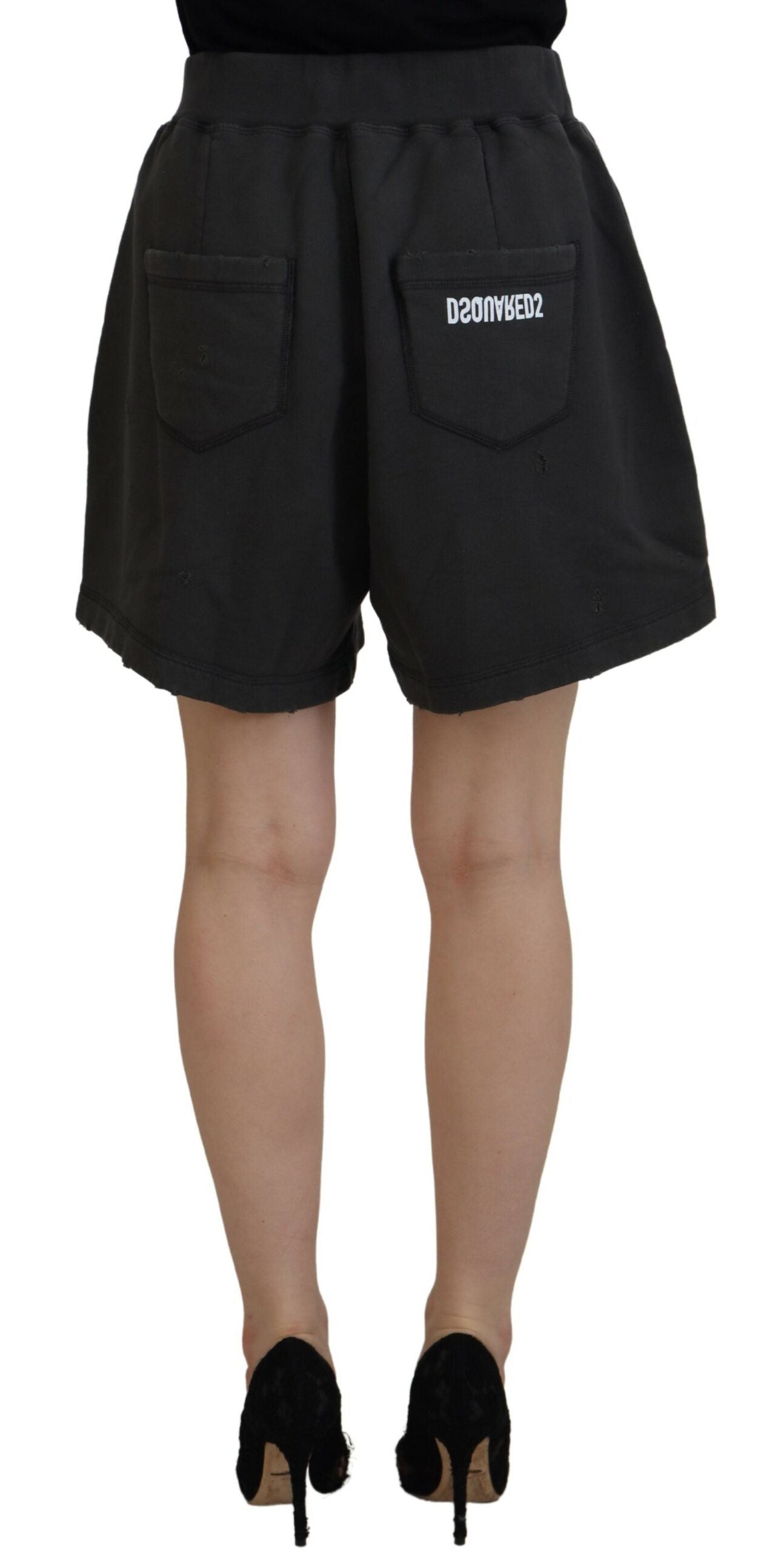 Shorts en coton noir Dsquared² à taille mi-haute, déchirés et tapered, avec un style décontracté et tendance.