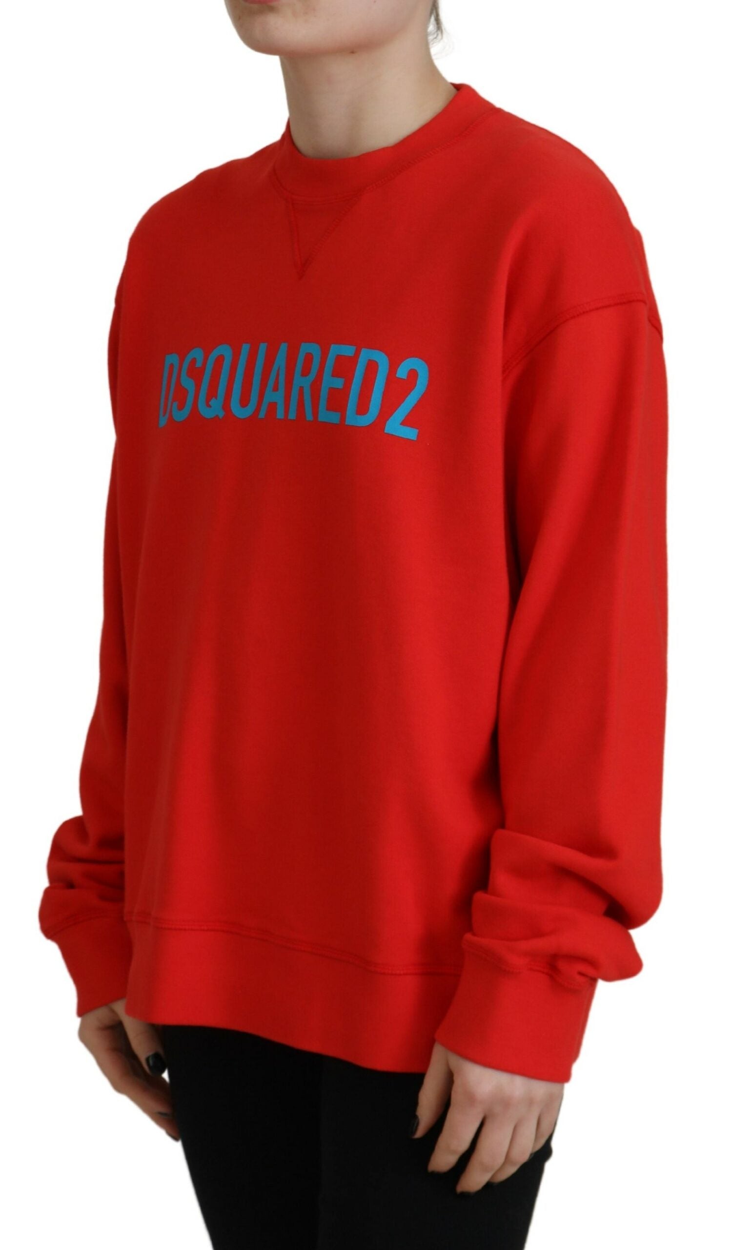 Pull rouge en coton imprimé avec col rond et manches longues de la marque Dsquared², vue en gros plan sur le tissu et le motif.