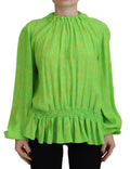 Chemise longue en viscose verte à étoiles Dsquared² avec manches longues et motif étoilé visible sur l'image.