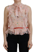 Haut sans manches en soie rose à imprimé floral avec col ascot signé Dsquared², élégant et féminin.