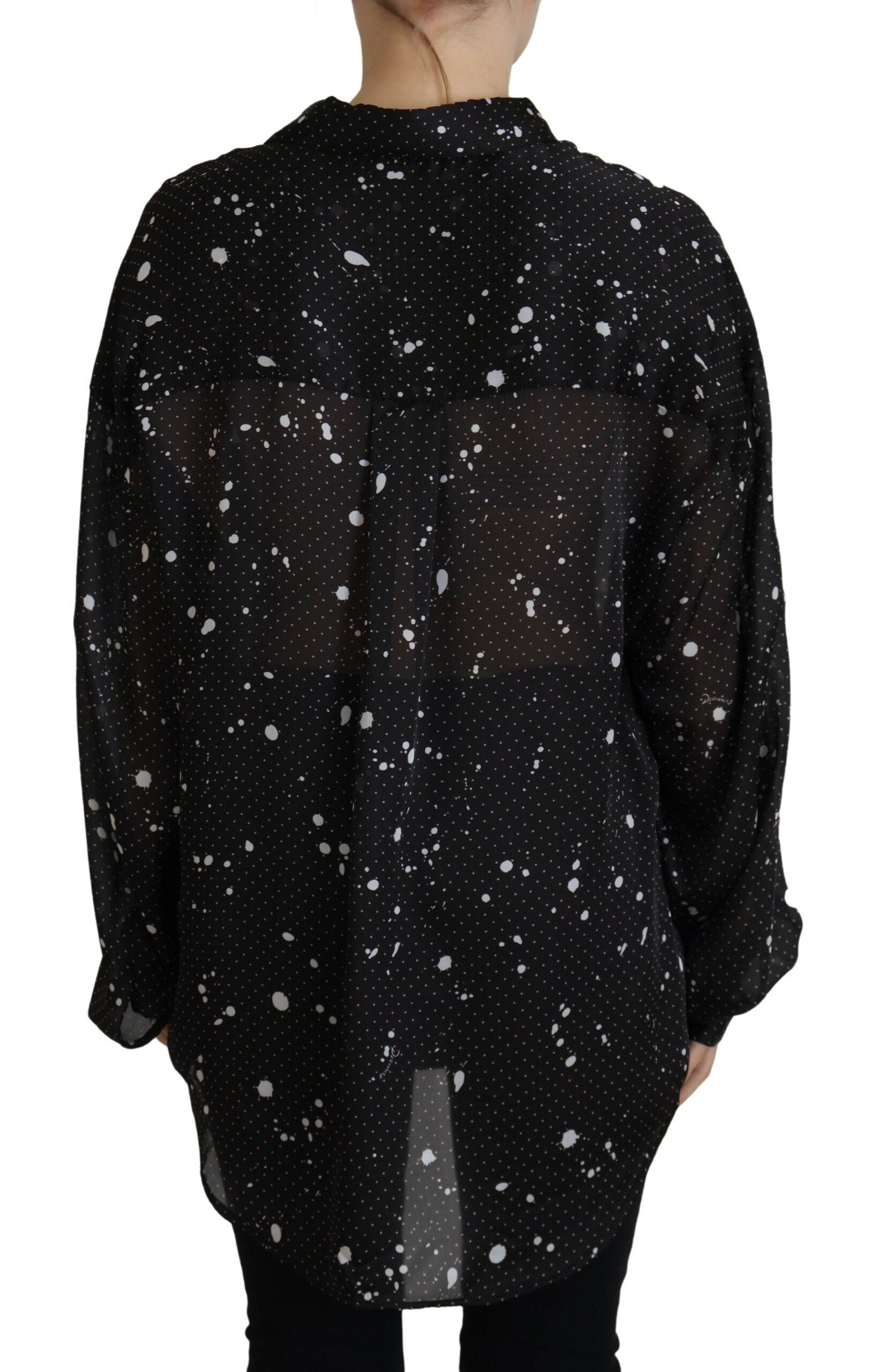 Chemisier noir à pois blancs avec col et boutons de la marque Dsquared², vue en gros plan.