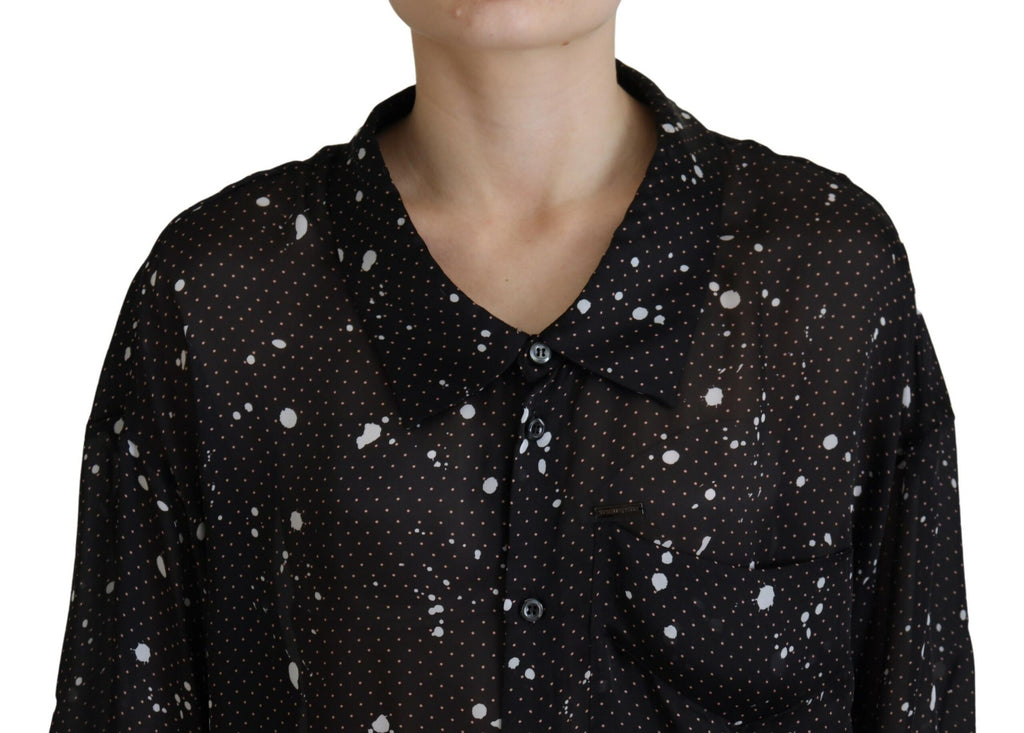 Chemisier noir à pois à col avec boutons de la marque Dsquared², vue en gros plan sur le tissu et les détails du col.