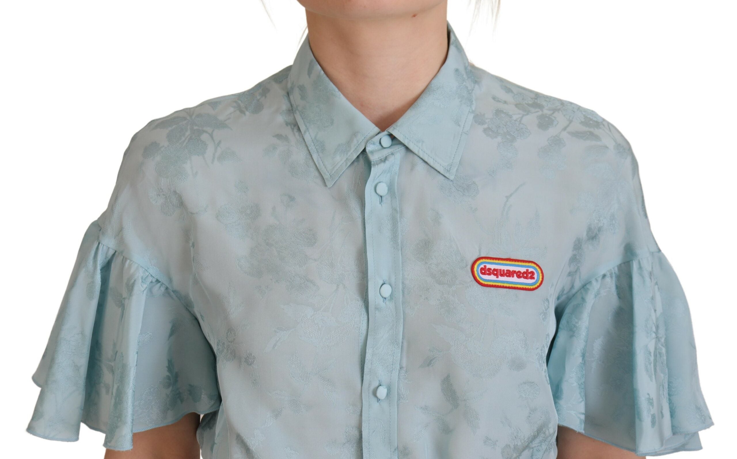 Chemise courte bleue à manches courtes avec col de la marque Dsquared², boutonnière visible, tissu léger et tendance.