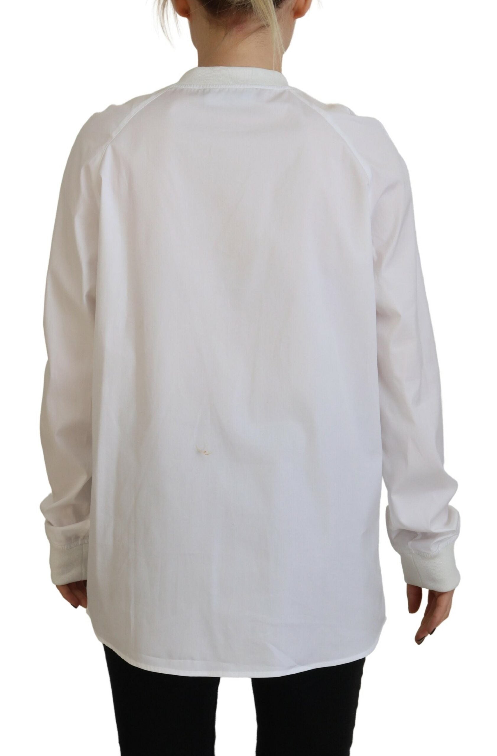 Haut en coton blanc à manches longues et col rond de Dsquared², vue de face sur fond neutre.