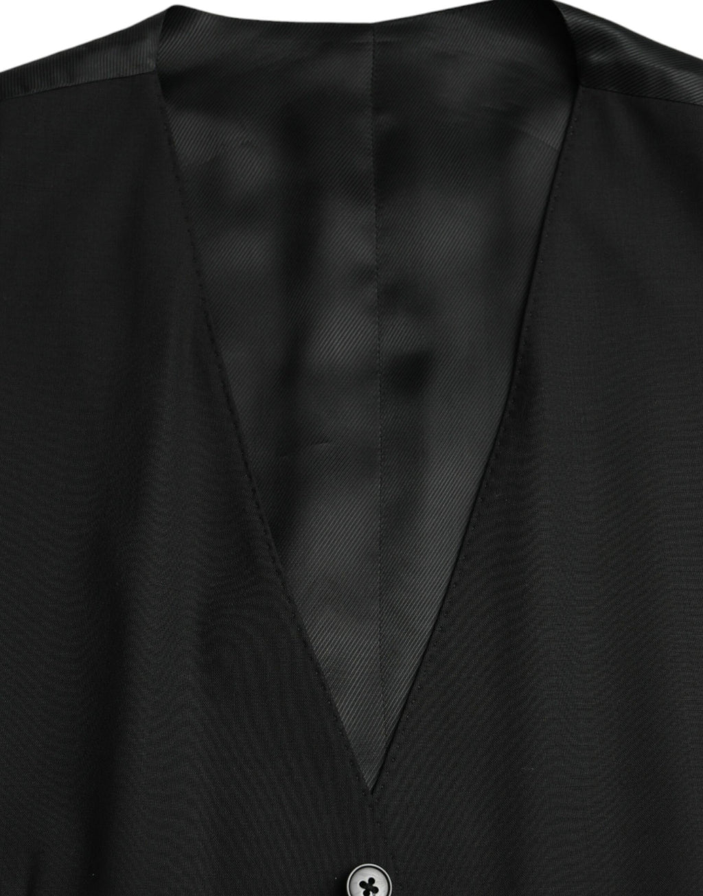 Gilet de costume en laine noire Dolce & Gabbana, veste formelle élégante pour homme, détails sophistiqués et finition soignée.