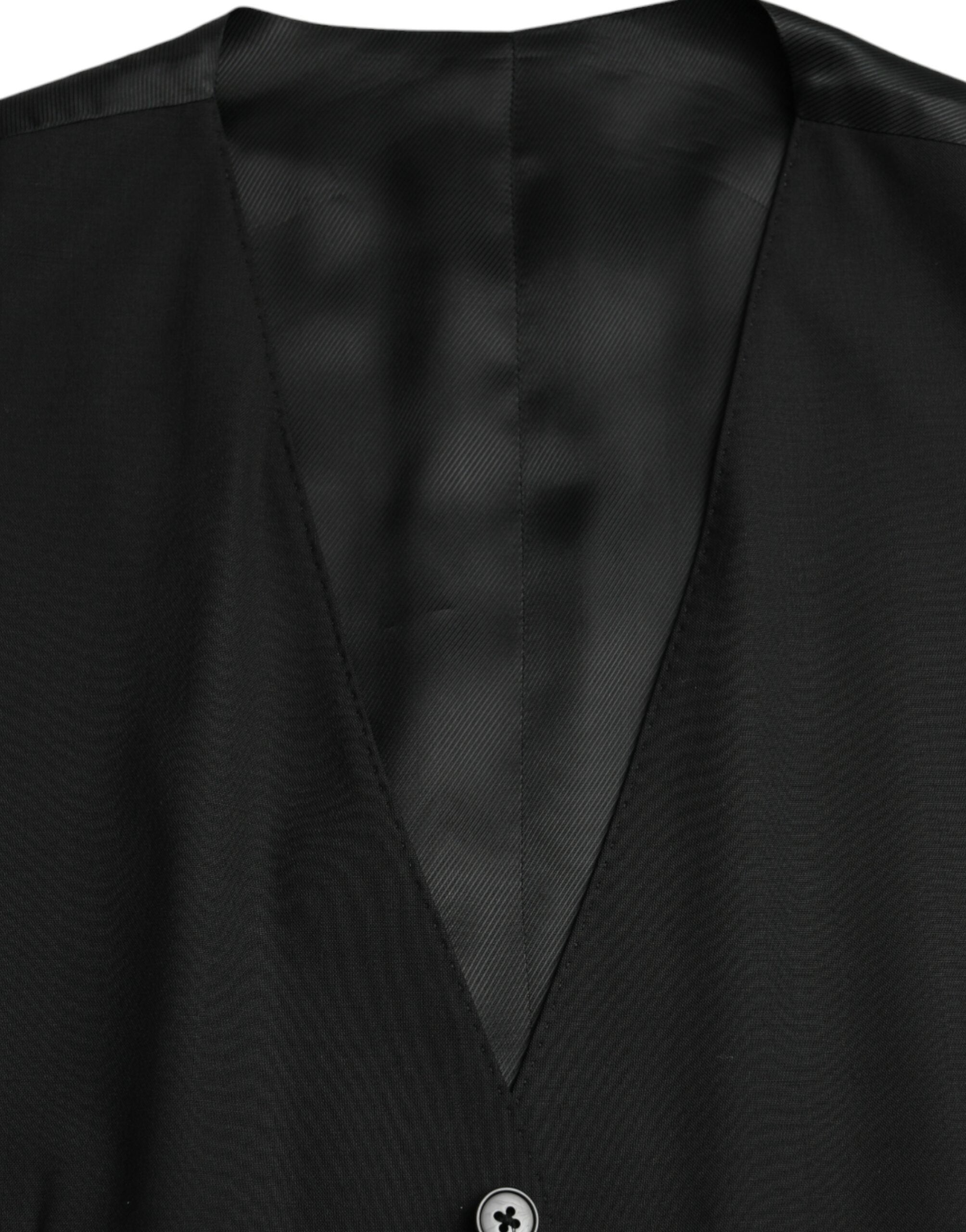Gilet de costume en laine noire Dolce & Gabbana, veste formelle élégante pour homme, détails sophistiqués et finition soignée.