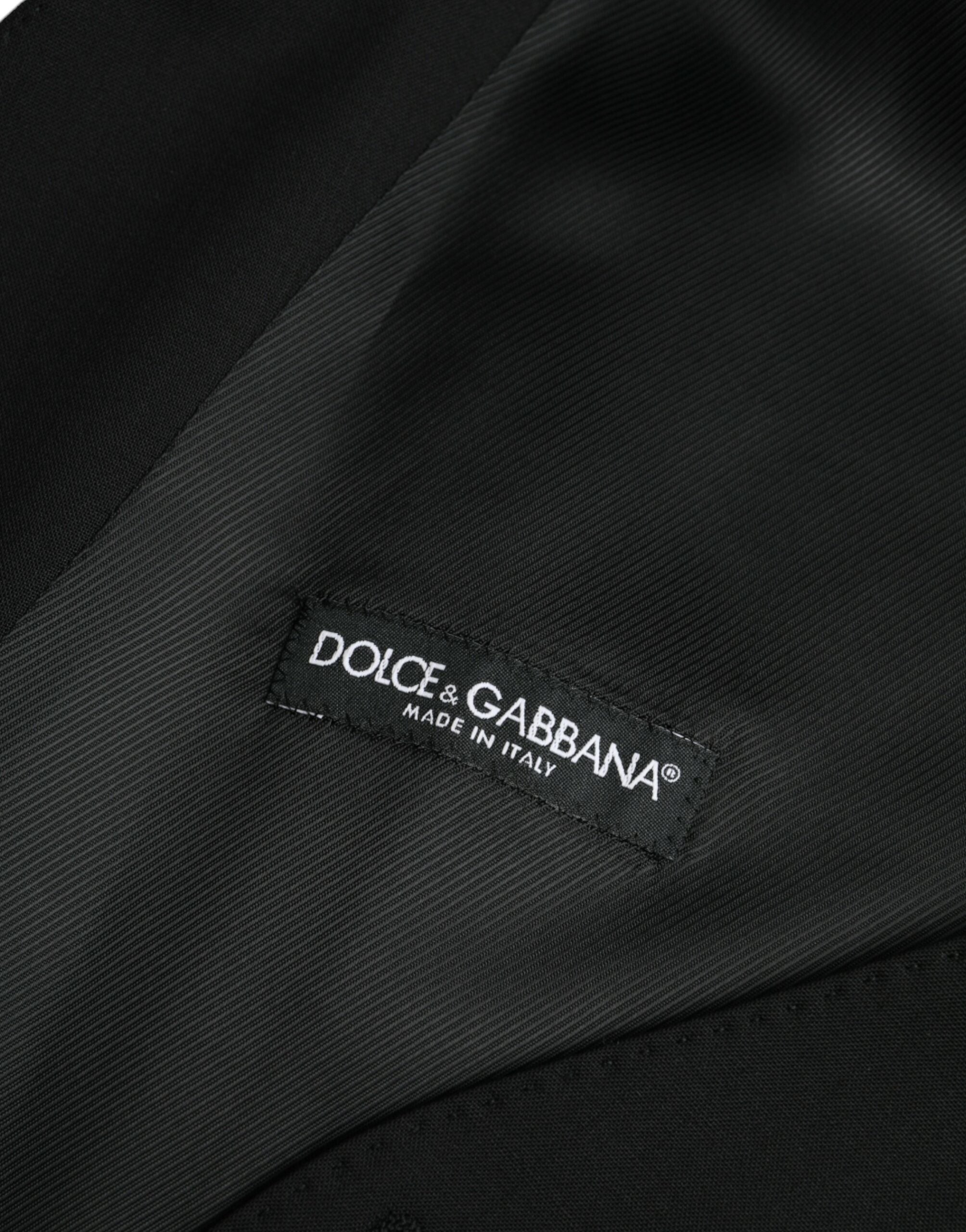 Gilet formel en laine noire de Dolce & Gabbana, veste cintrée élégante pour homme ou femme, détails sophistiqués.