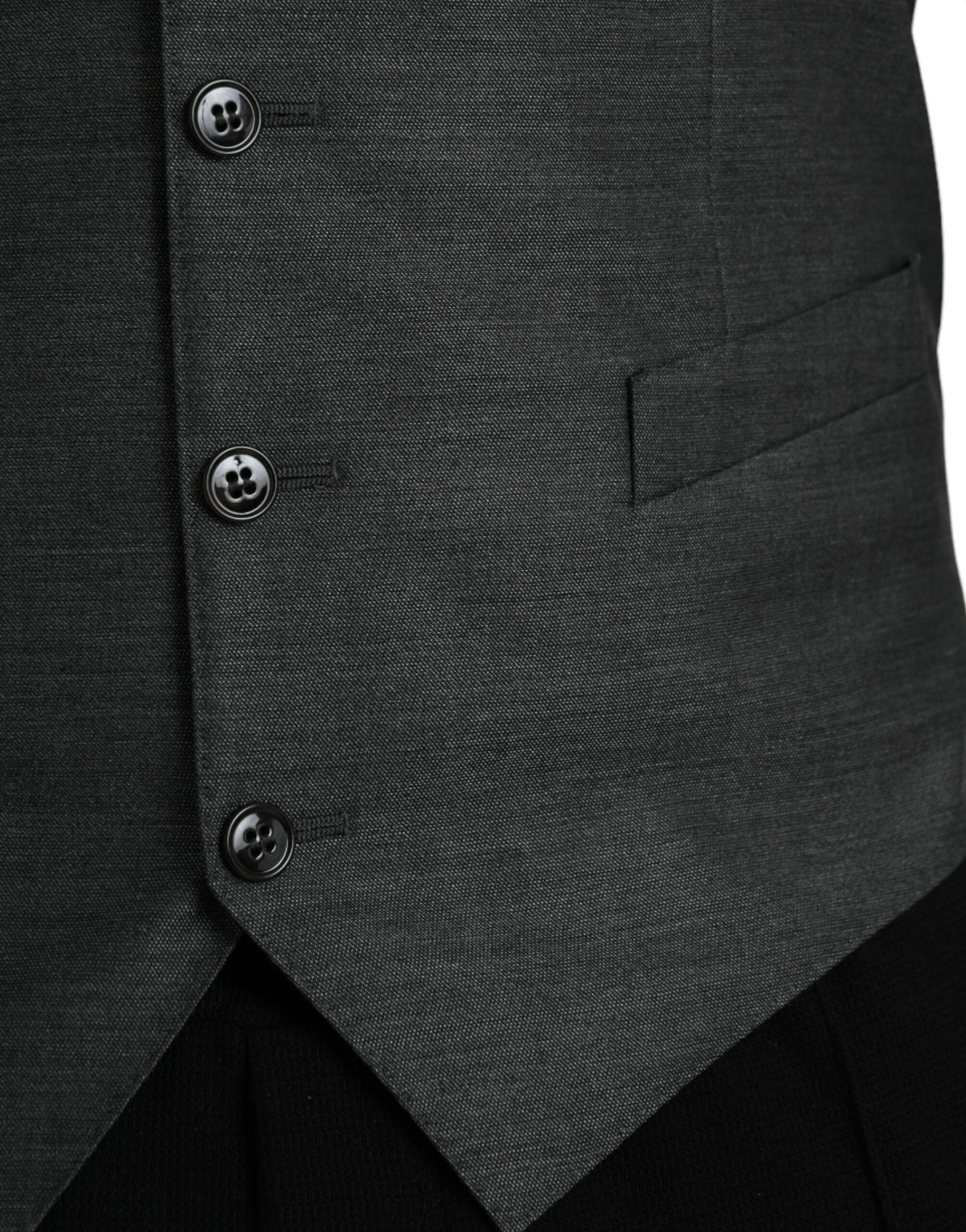 Gilet formel en laine grise de Dolce & Gabbana, veste élégante avec coupe sophistiquée pour homme ou femme.