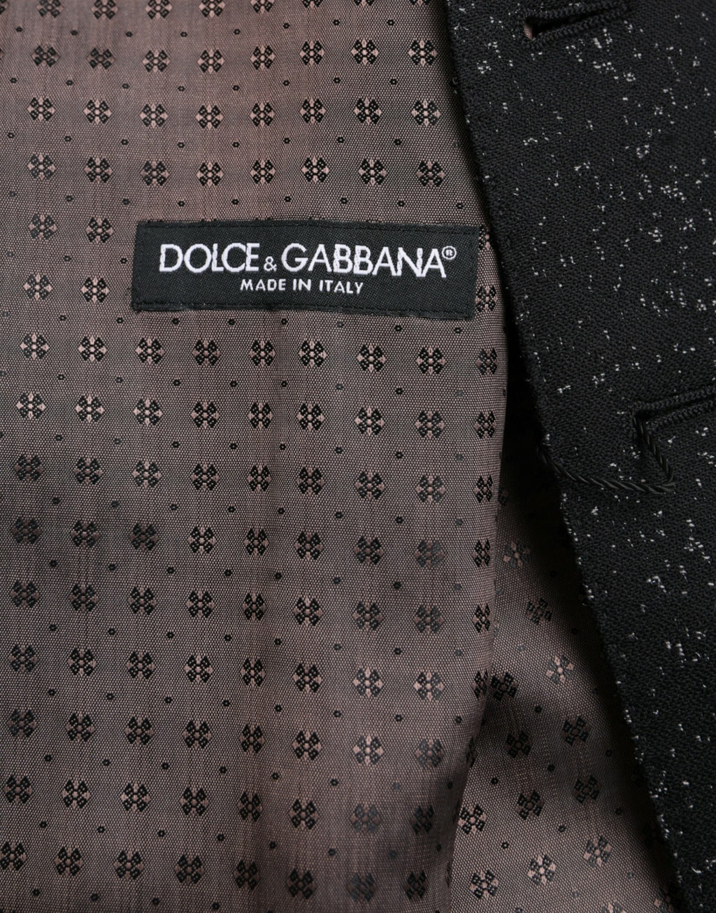Robe-waistcoat en soie noire et marron de Dolce & Gabbana, vêtement formel, ajustée avec col en V et détails élégants.