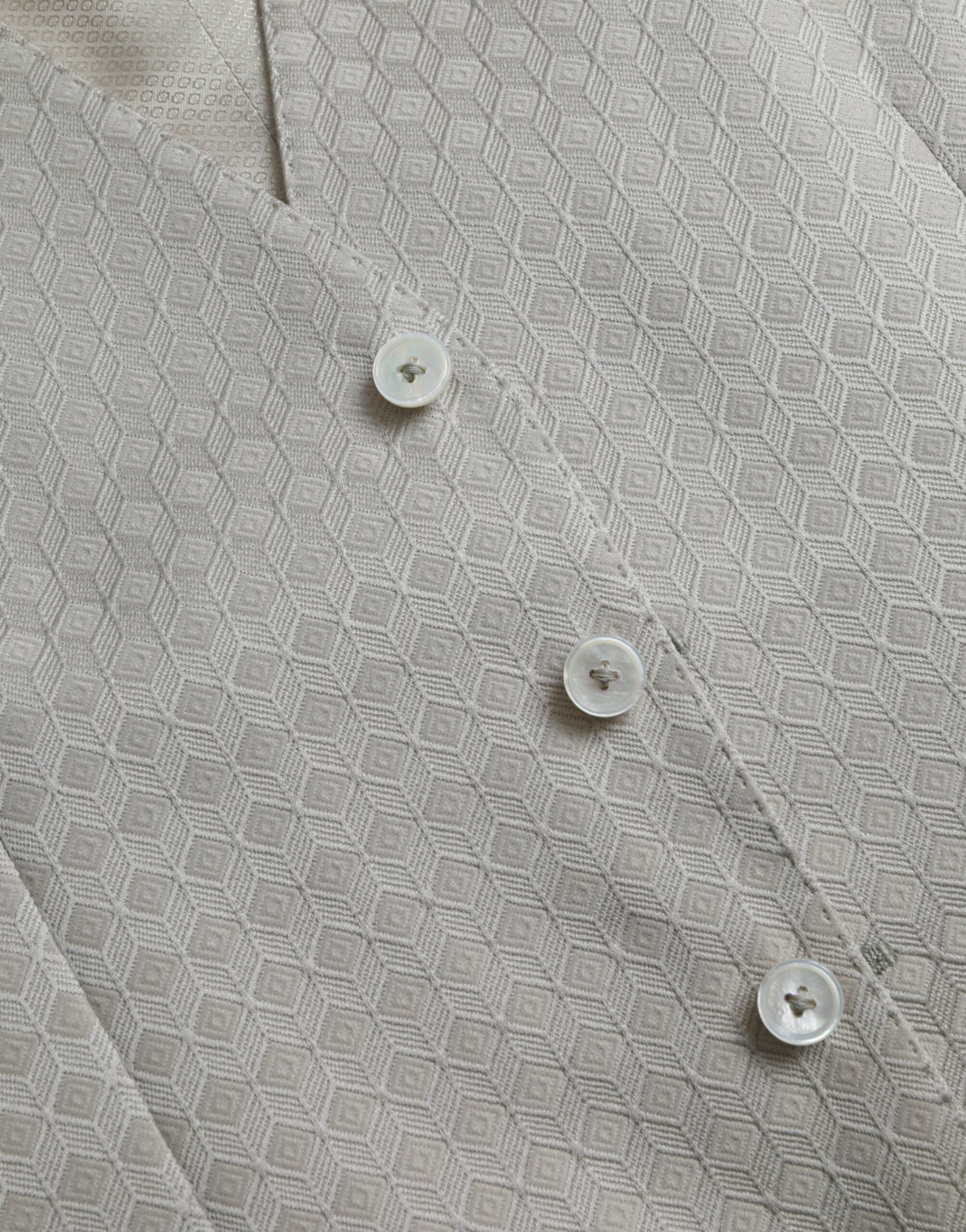 Robe sans manches en coton blanc Dolce & Gabbana, veste formelle élégante pour femme.