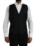 Robe de costume en soie noire Dolce & Gabbana, robe sans manches élégante avec ceinture à la taille, pour occasion formelle.