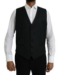 Gilet noir en laine Dolce & Gabbana, robe de costume formelle, veste élégante à la taille, détails sophistiqués.