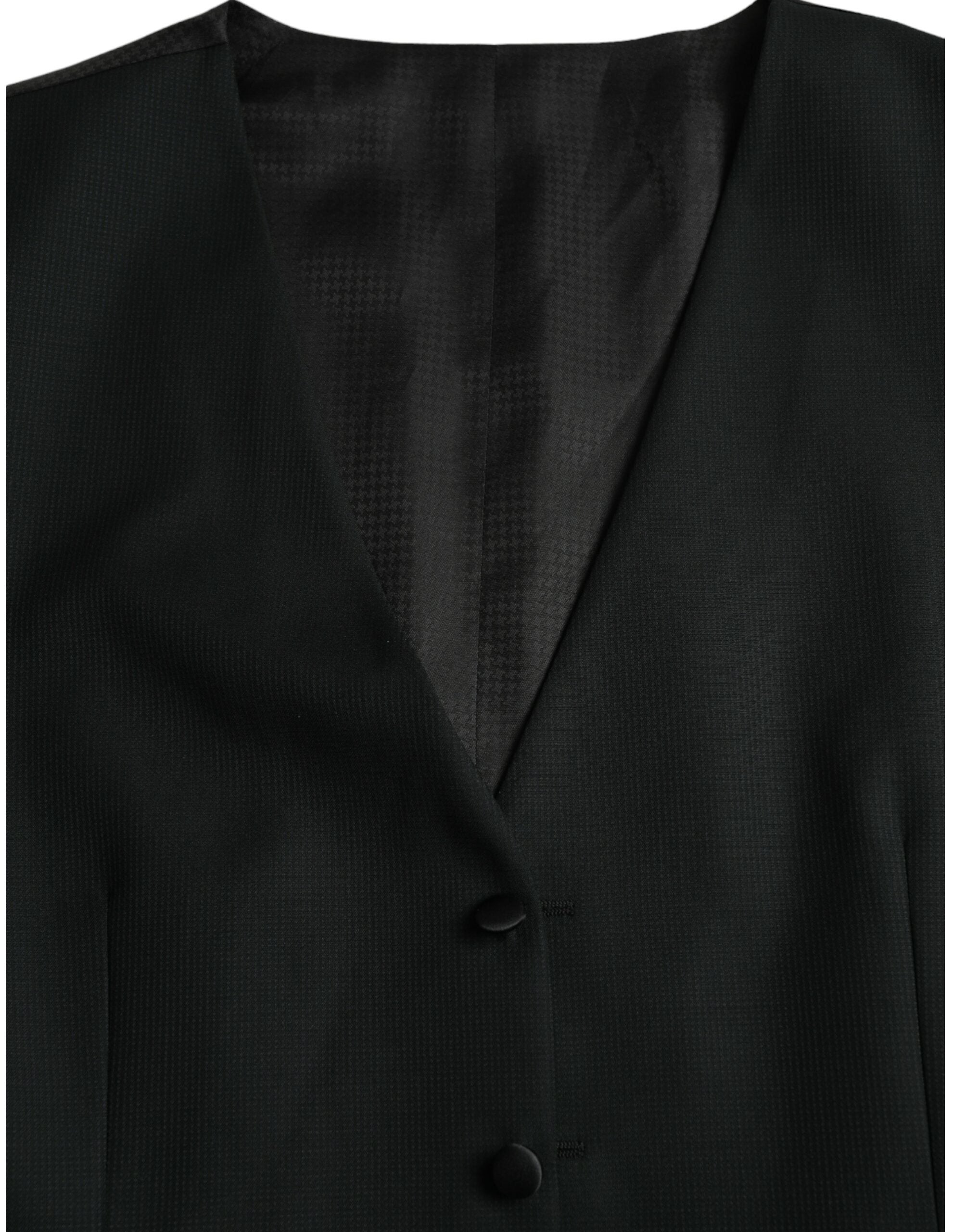 Robe-veste en laine noire Dolce & Gabbana, robe formelle élégante avec fermeture à boutons et col classique.