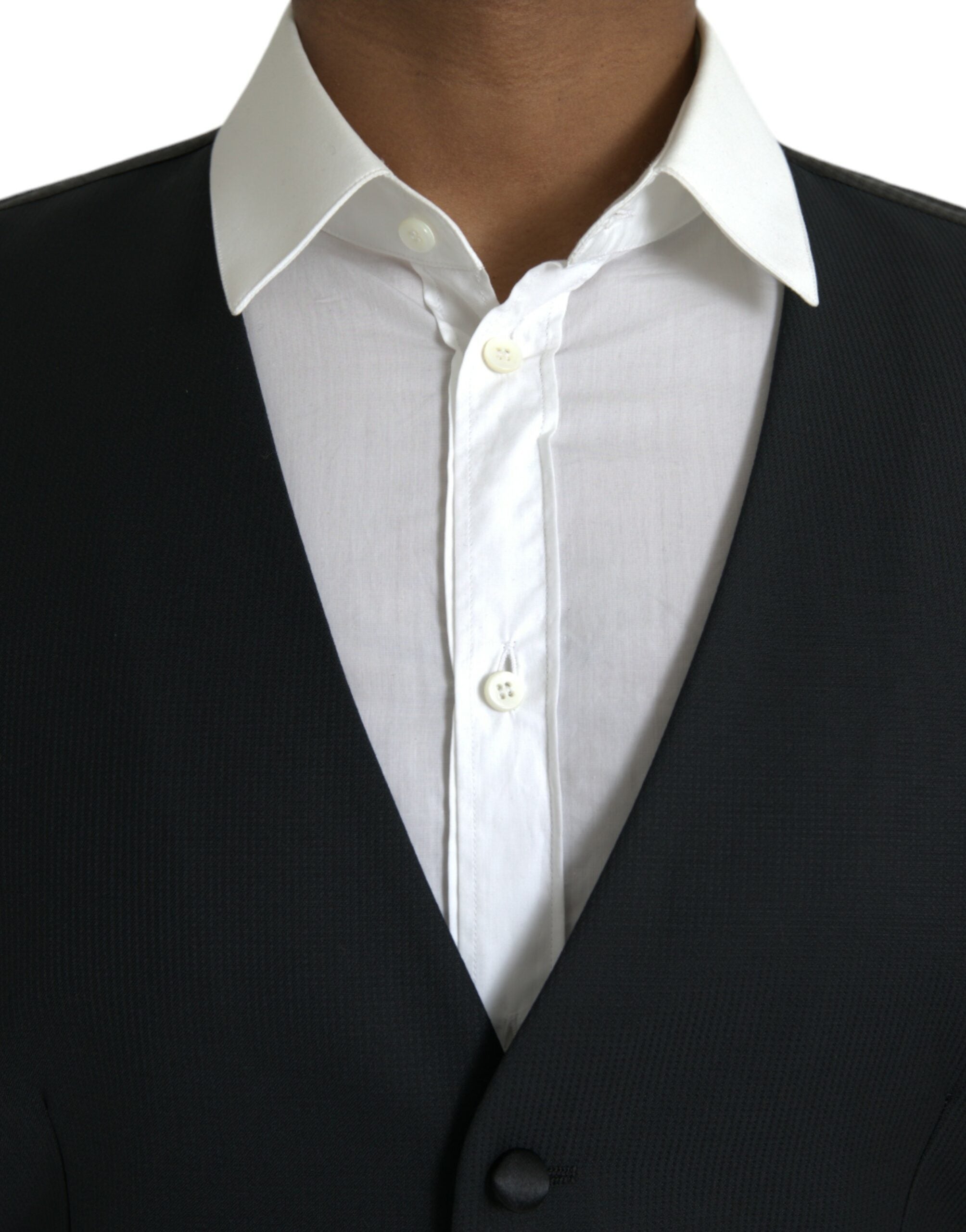 Robe-veste en laine noire Dolce & Gabbana, élégante et formelle, avec coupe ajustée et détails sophistiqués.