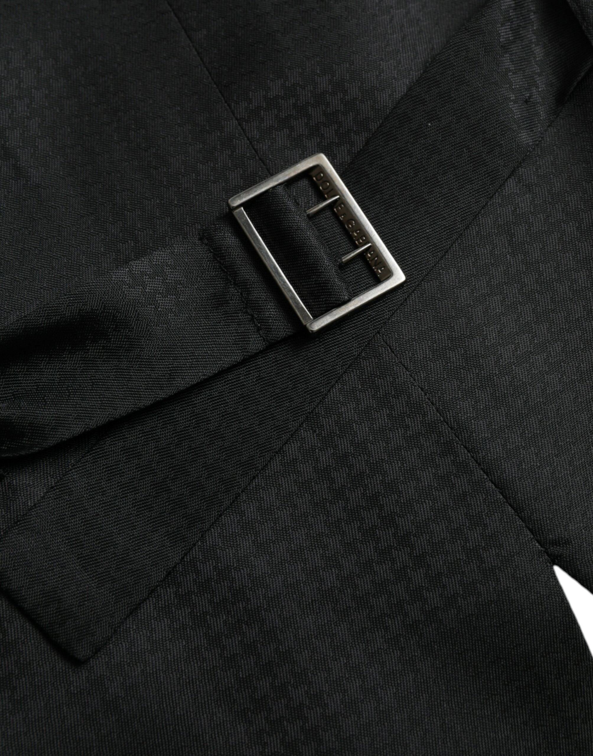 Robe-veste en laine noire Dolce & Gabbana, vêtement formel pour femme avec coupe élégante et détails sophistiqués.