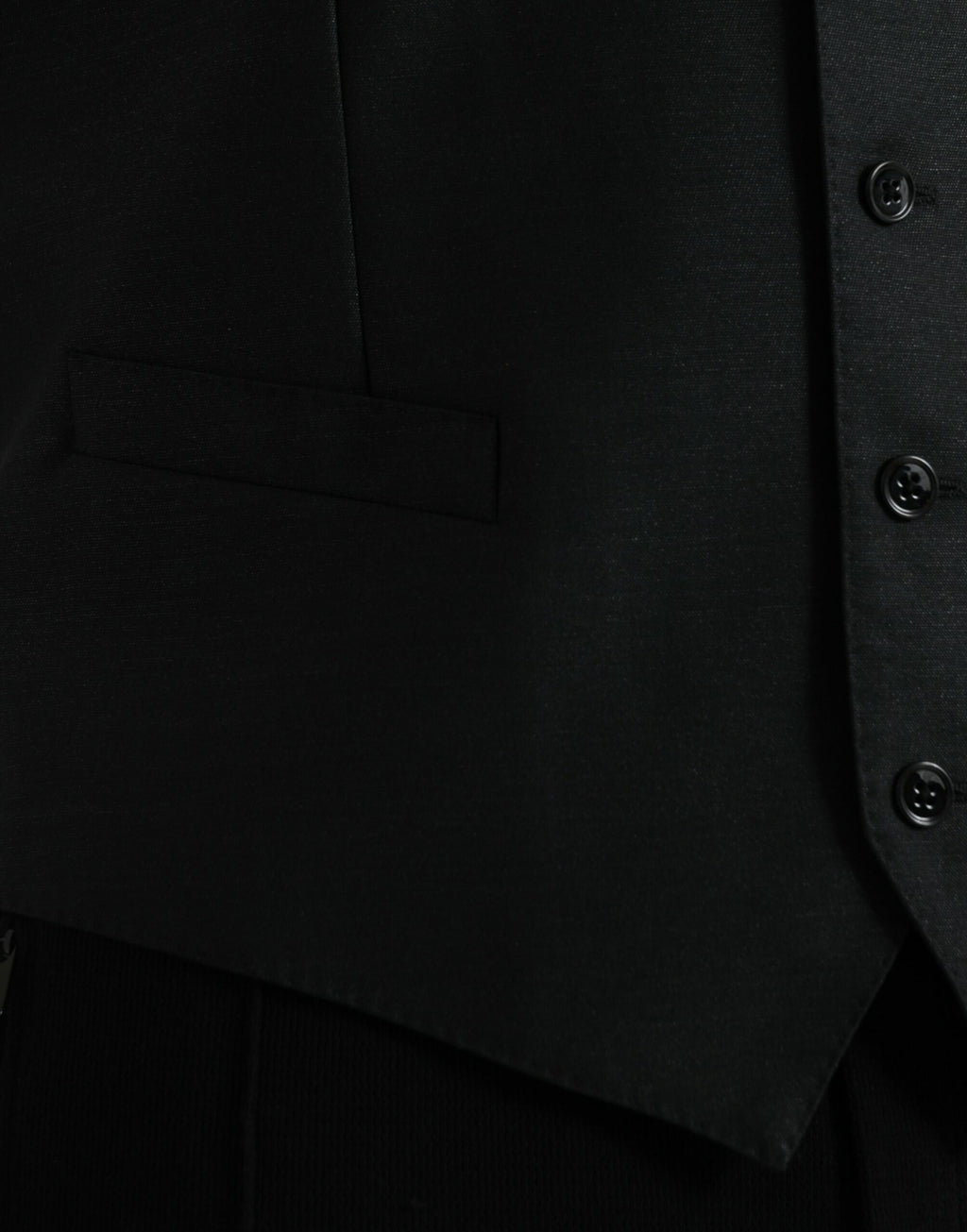 Gilet de robe en laine noire Dolce & Gabbana, vêtement de cérémonie élégant et ajusté, détail de couture raffiné.