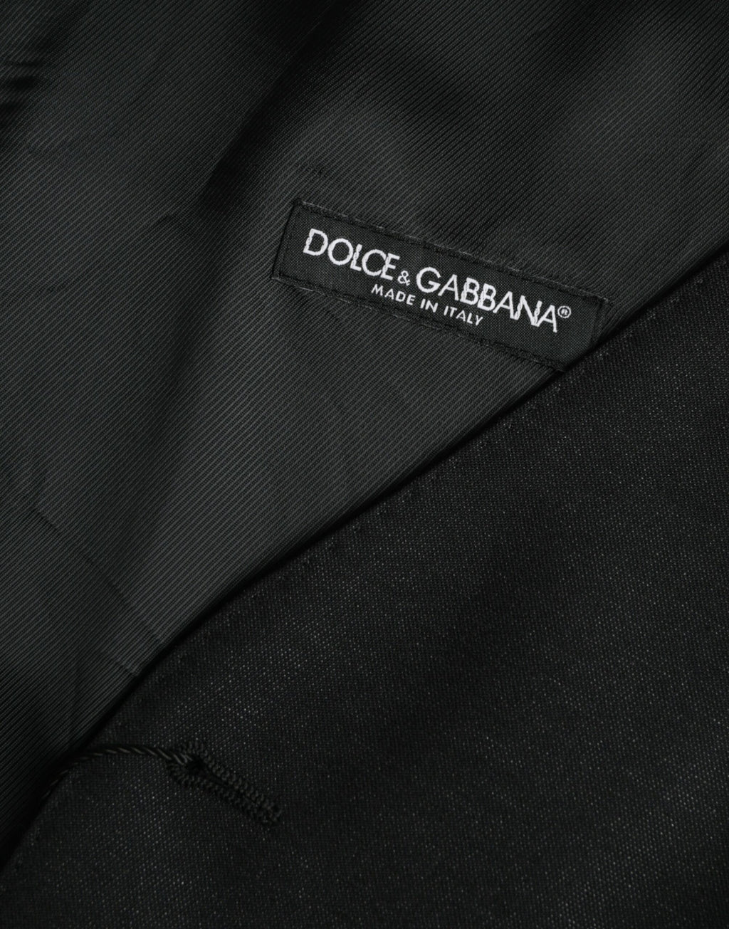 Gilet noir en laine Dolce & Gabbana, robe de costume formelle élégante avec coupe ajustée et détails sophistiqués.