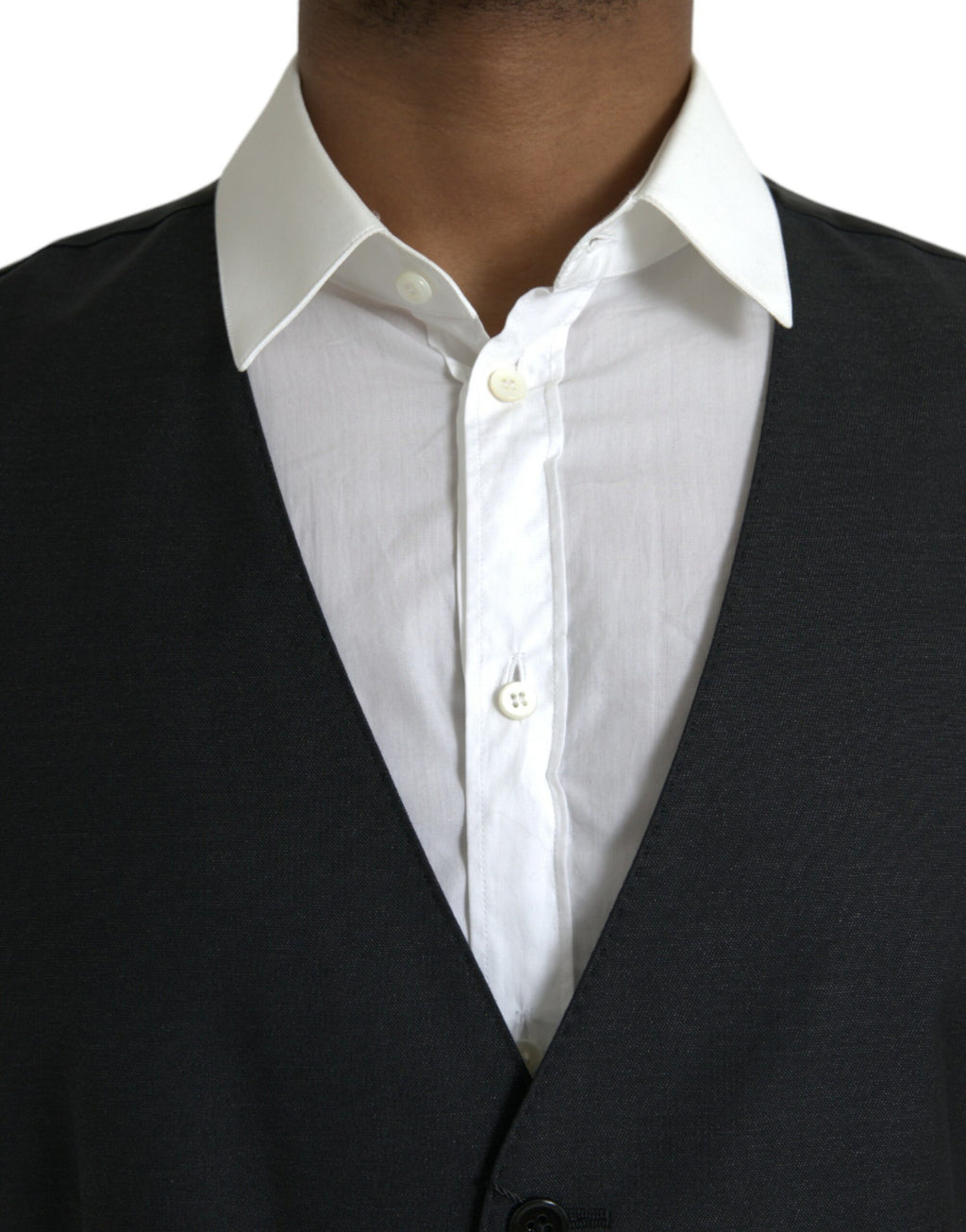 Robe-antoine en laine noire de Dolce & Gabbana, veste formelle ajustée, détail élégant et tissu sophistiqué.