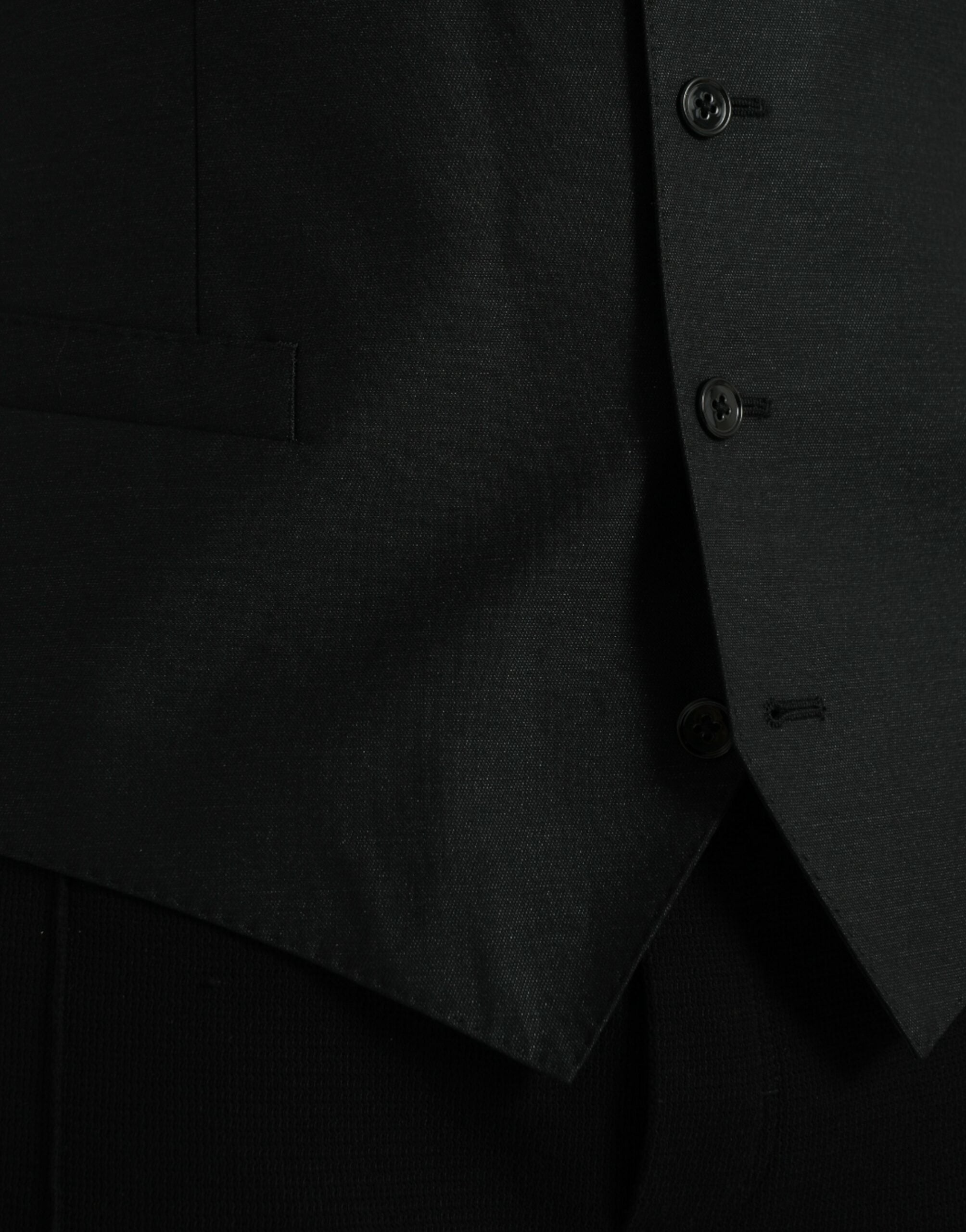 Gilet habillé en laine noire de marque Dolce & Gabbana, veste formelle élégante pour femme, détails sophistiqués.