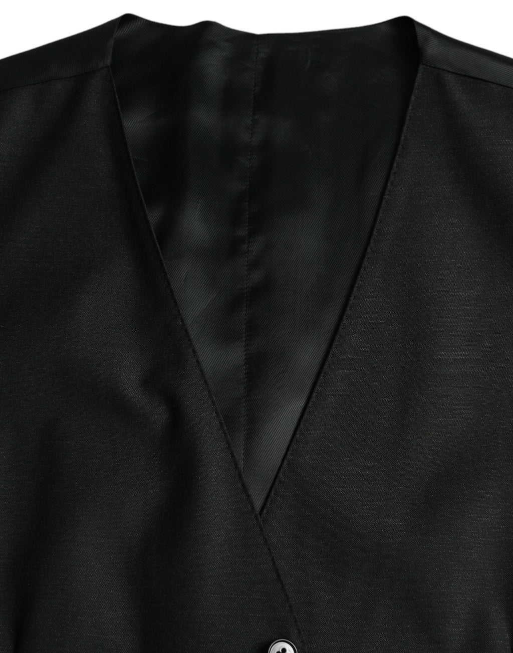 Gilet noir en laine Dolce & Gabbana, robe veste formelle élégante avec coupe ajustée et détails sophistiqués.