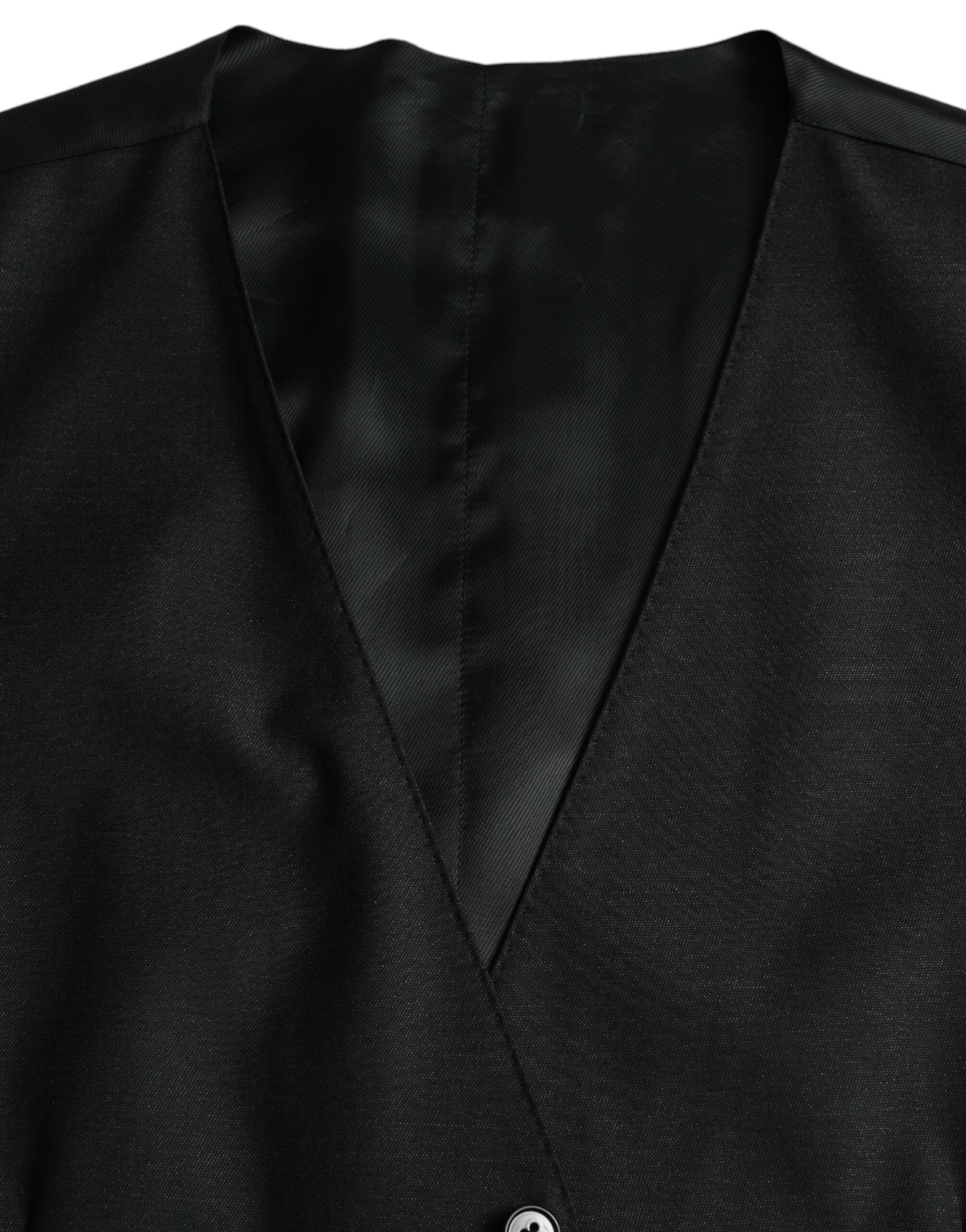 Gilet noir en laine Dolce & Gabbana, robe veste formelle élégante avec coupe ajustée et détails sophistiqués.