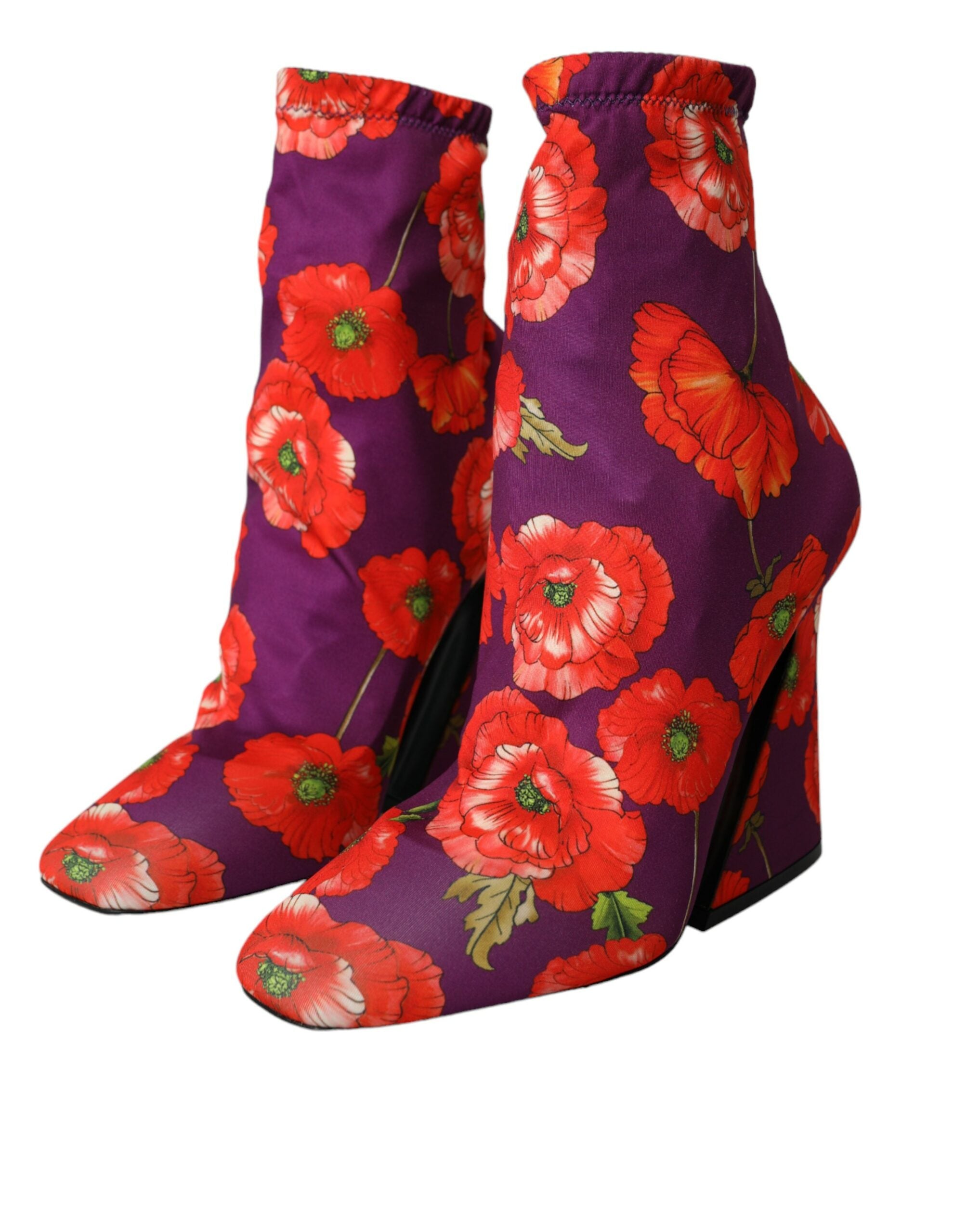 Bottes Dolce & Gabbana en jersey extensible violet à motif floral, style élégant et confortable, visibles dans l'image.