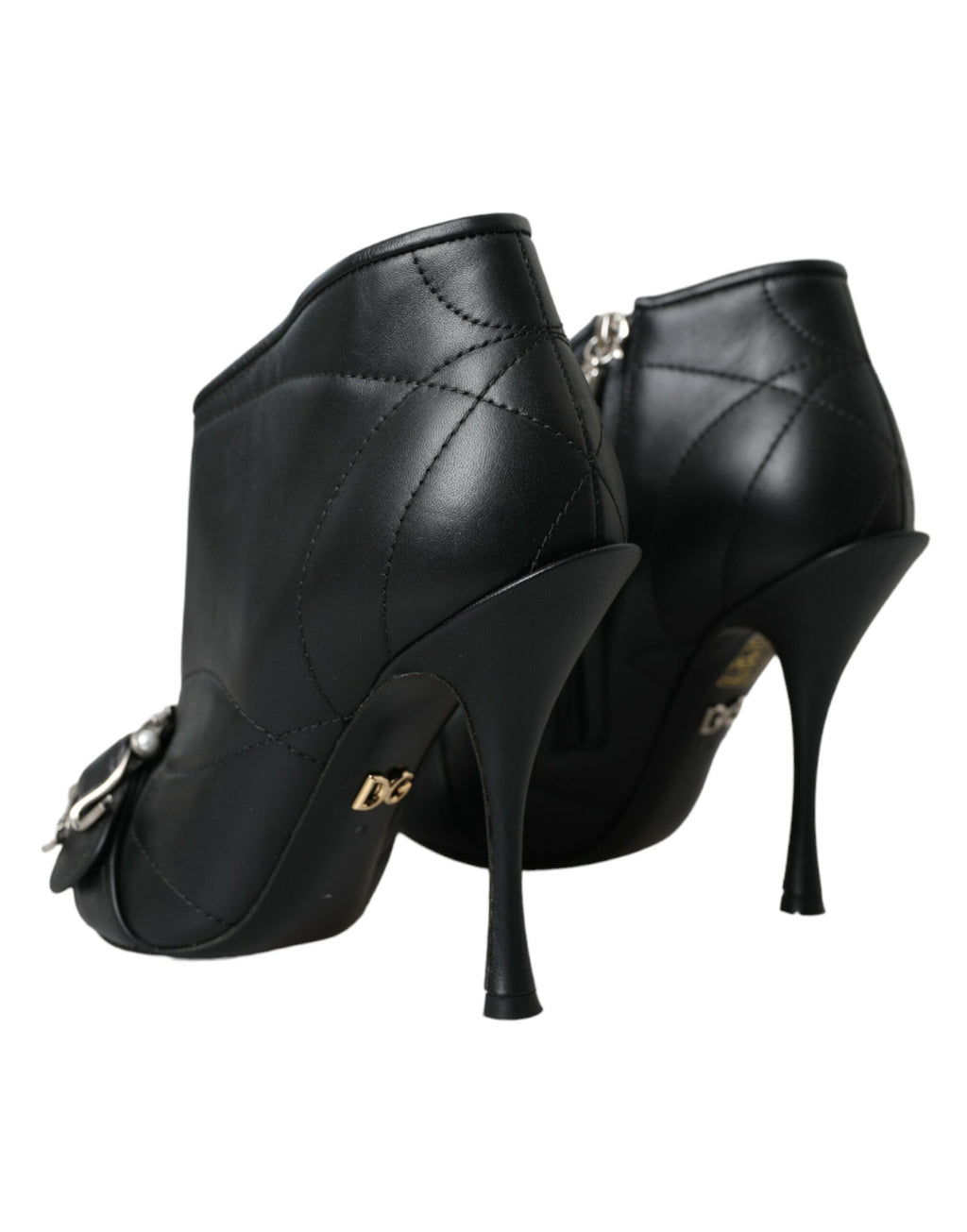 Bottes noires Dolce & Gabbana Devotion en cuir matelassé avec boucle, semelle robuste et design élégant.