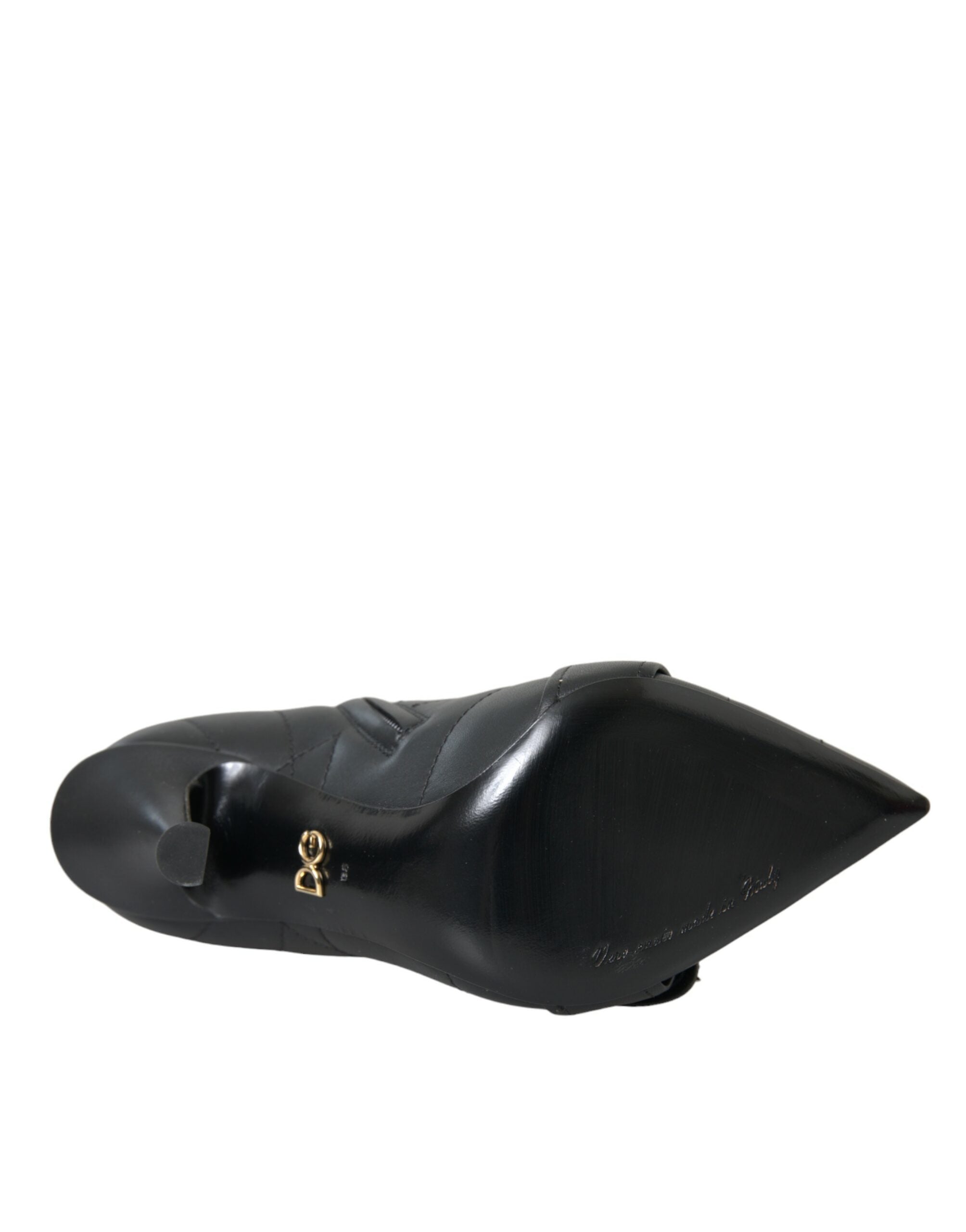 Bottes noires Dolce & Gabbana Devotion en cuir matelassé avec boucle, style élégant et sophistiqué.