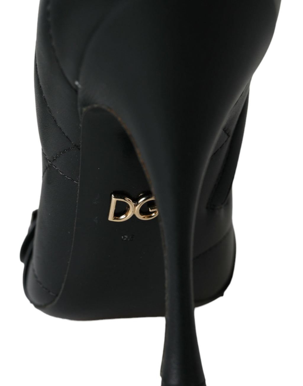 Bottes noires Dolce & Gabbana Devotion à carreaux matelassés avec boucle en cuir, mode élégante et sophistiquée.
