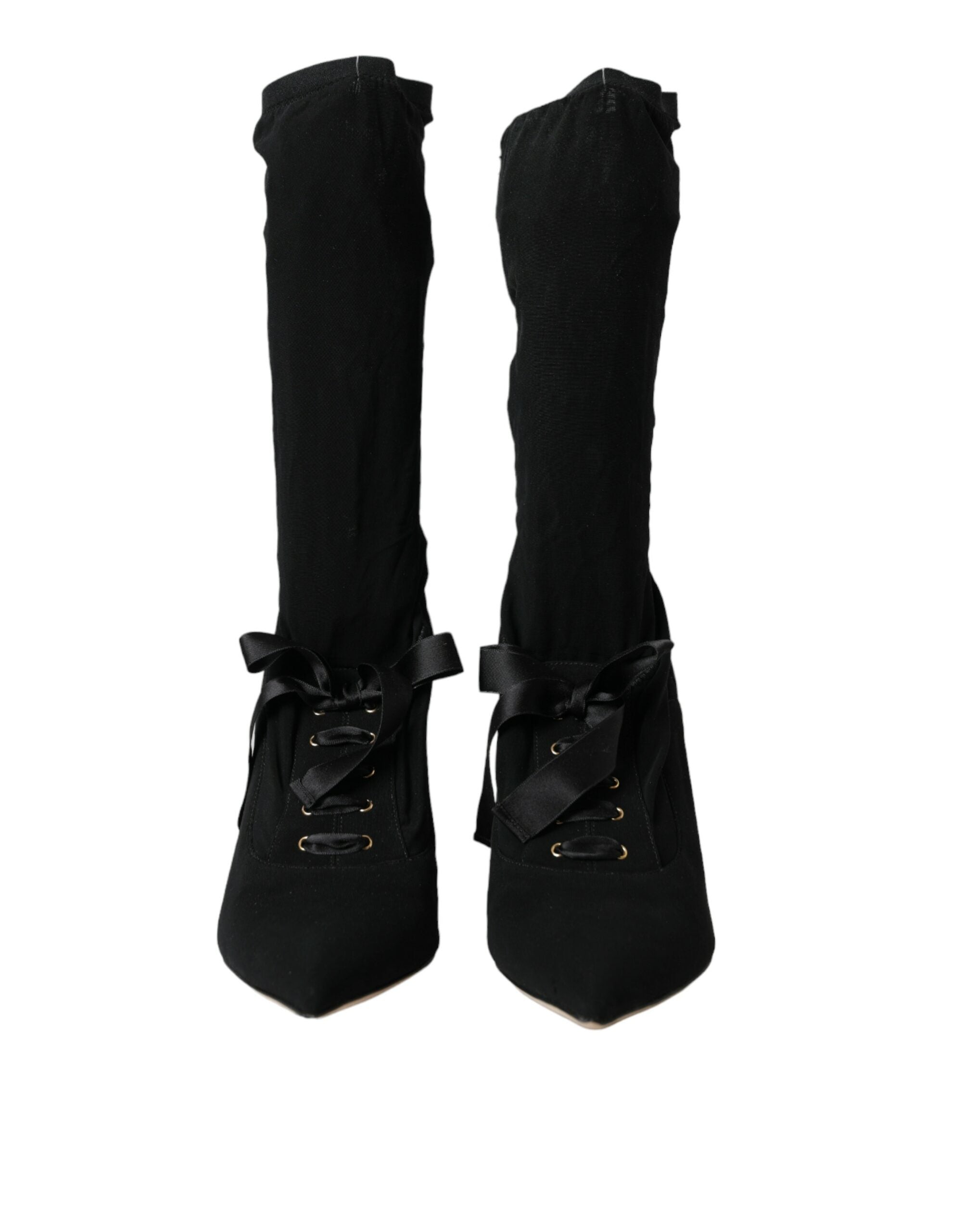 Chaussures Dolce & Gabbana, bottines noires à talons stilettos et mi-mollet, élégantes et sophistiquées.
