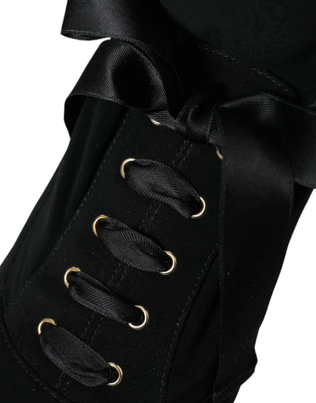 Chaussures Dolce & Gabbana bottines à talons stilettos noirs mi-mollet, élégantes et sophistiquées.
