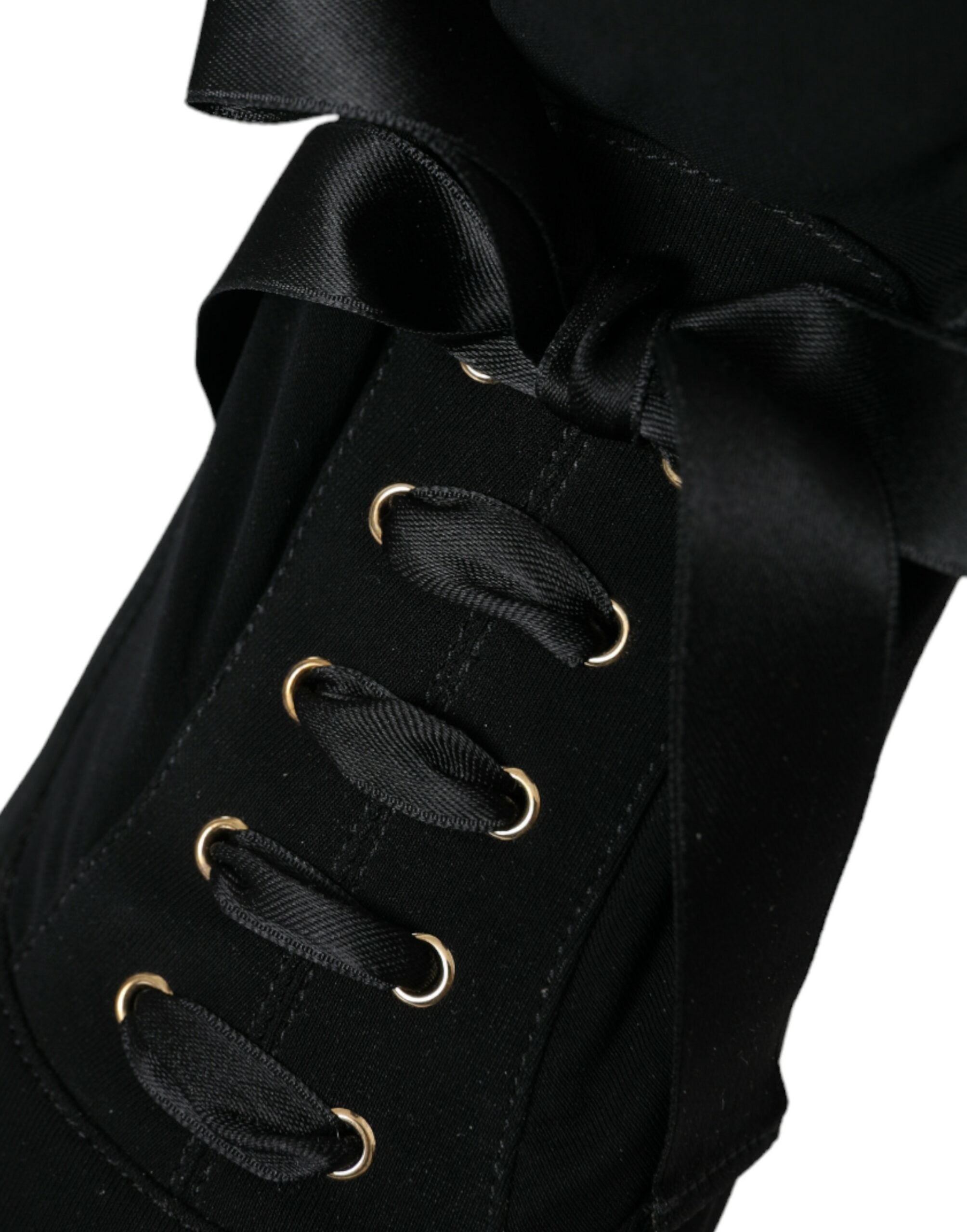 Chaussures Dolce & Gabbana bottines à talons stilettos noirs mi-mollet, élégantes et sophistiquées.