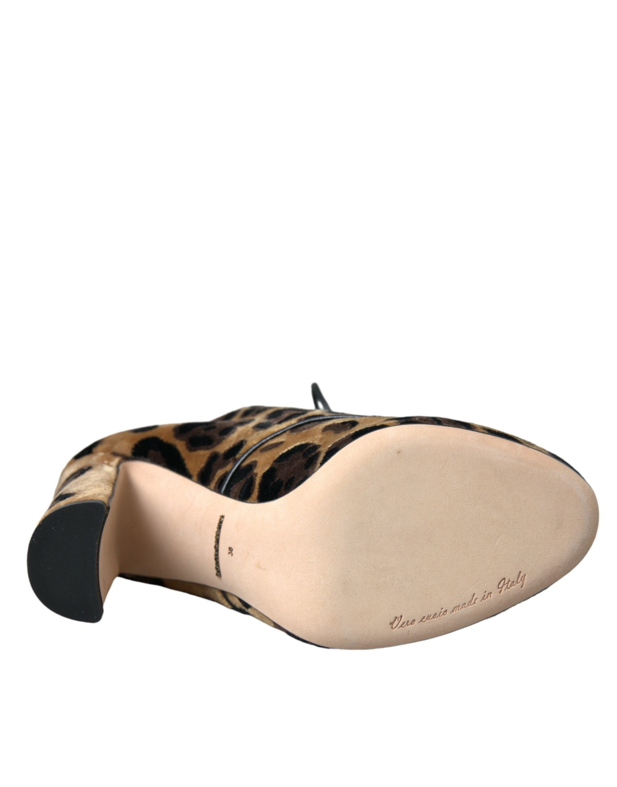 Chaussures Dolce & Gabbana, bottines en cuir marron à motif léopard et lacets, style élégant et tendance.