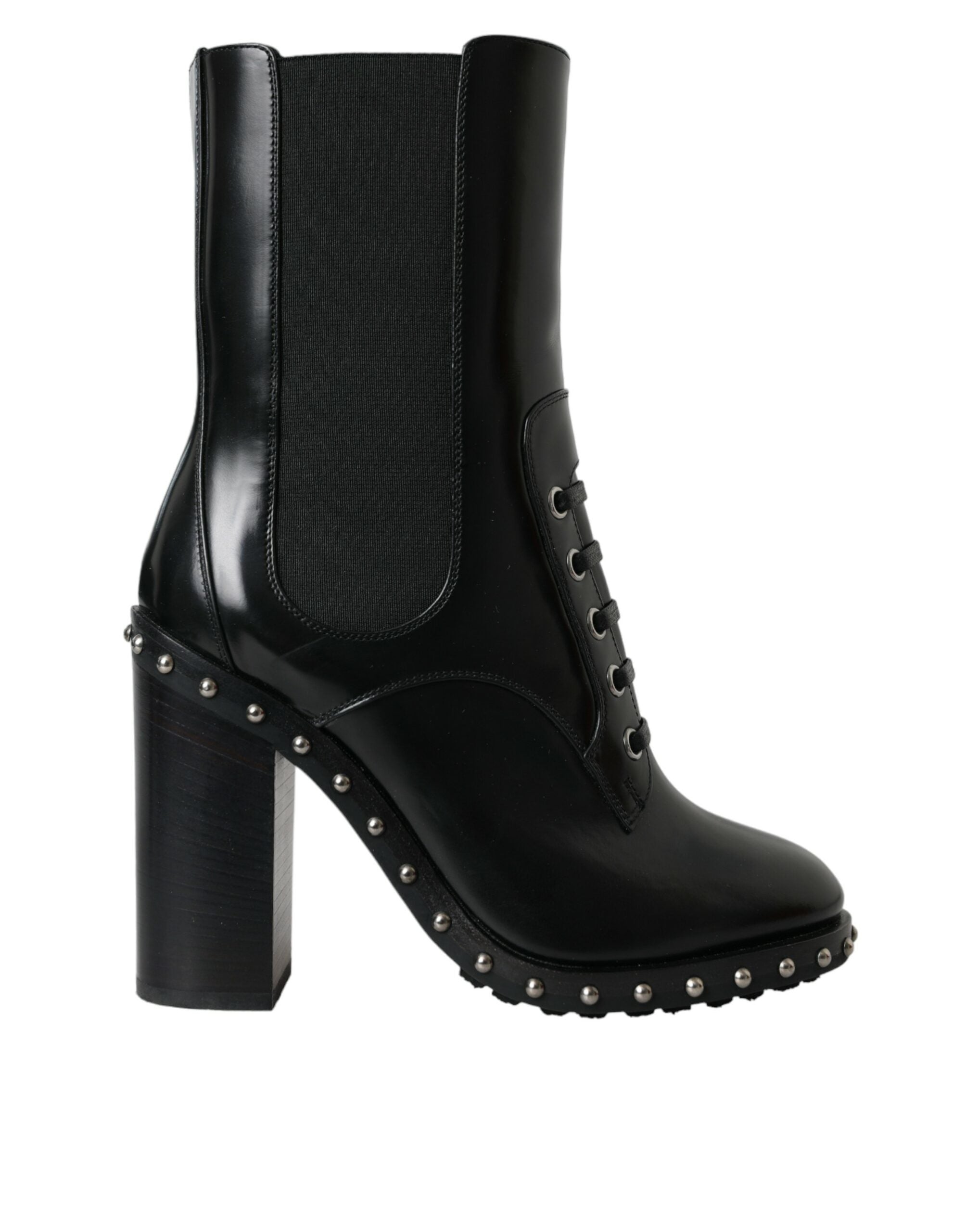 Bottes en cuir noir Dolce & Gabbana avec clous, lacets et semelle robuste, élégantes et tendance pour femmes.