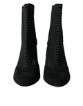 Chaussures Dolce & Gabbana talons aiguilles en résille noire, bottines élégantes à la cheville, mode sophistiquée et chic