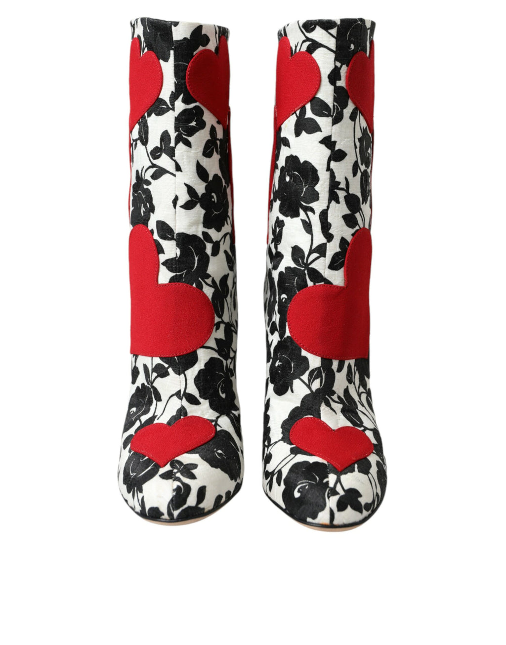 Bottes hautes en cuir blanc Dolce & Gabbana avec motifs de cœurs floraux, élégantes et sophistiquées.