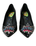 Escarpins noirs en cuir Dolce & Gabbana avec patch BOOM, semelle en talon haut et design élégant.