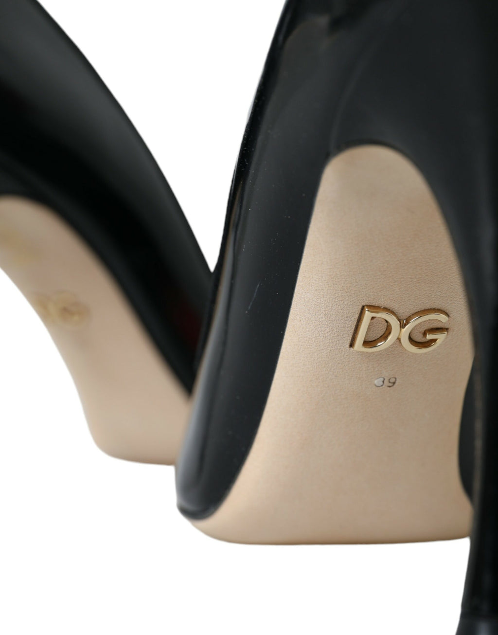 Chaussures à talons Dolce & Gabbana en cuir noir avec patchs WOW, élégantes et modernes, vues de face.