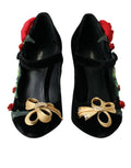 Broche en cristal roses noires Dolce & Gabbana sur chaussures Mary Jane élégantes.