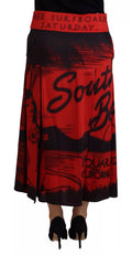 Jupe midi plissée à taille haute rouge imprimée de Dsquared², silhouette en forme d'A, tissu léger et élégant.