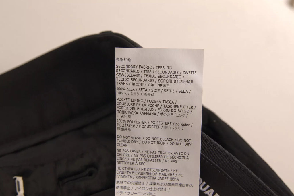 Pantalons noirs à taille haute et coupe évasée en viscose de la marque Dsquared², visibles sur l'image.