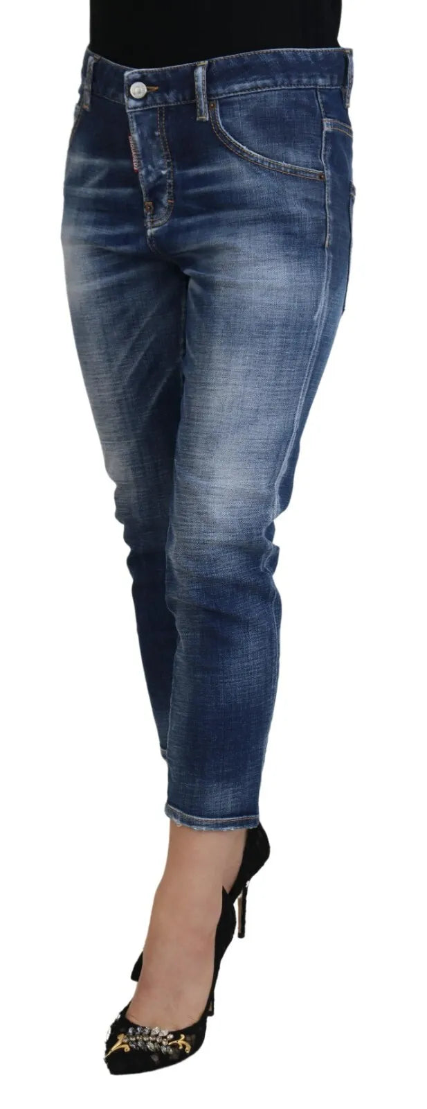 Jeans déchirés bleu en coton à taille moyenne, coupe courte, de la marque Dsquared², style cool girl, vêtement tendance.