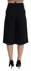 Pantalons noirs à taille haute et jambes larges de la marque Dsquared², coupe cropped, en tissu léger et élégant.