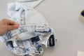 Jeans en denim blanc cassé à taille haute et coupe droite de Dsquared², en coton, visibles avec détails de couture.