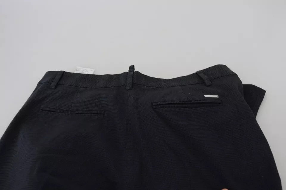 Pantalon droit à carreaux noirs à taille haute de Dsquared², look élégant et moderne, visible en détail dans l’image.