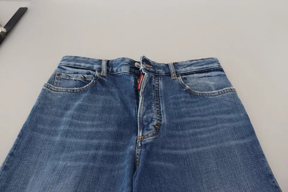 Jeans en denim bleu déchiré à taille haute et coupe droite de la marque Dsquared², vue de face.