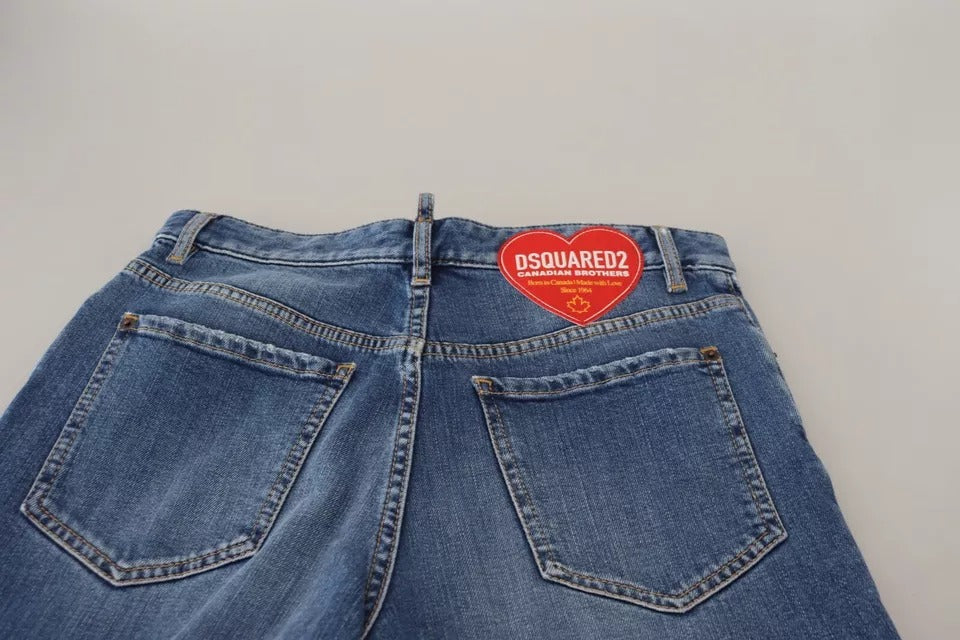 Jeans en denim bleu déchiré à taille haute et coupe droite de Dsquared², visible avec détails usés et style décontracté.