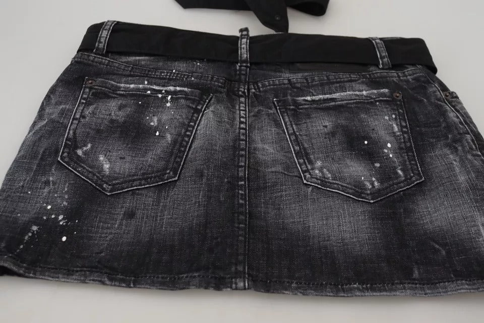 Jupe en jean noire Dsquared², coupe mi-hauteur, style déchiré, coupe trapèze, courte et tendance.